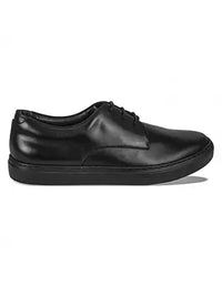 Black leather shoe on a white background