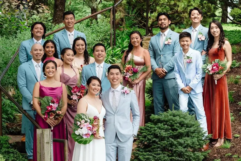 wedding party in bright blue wedding suits