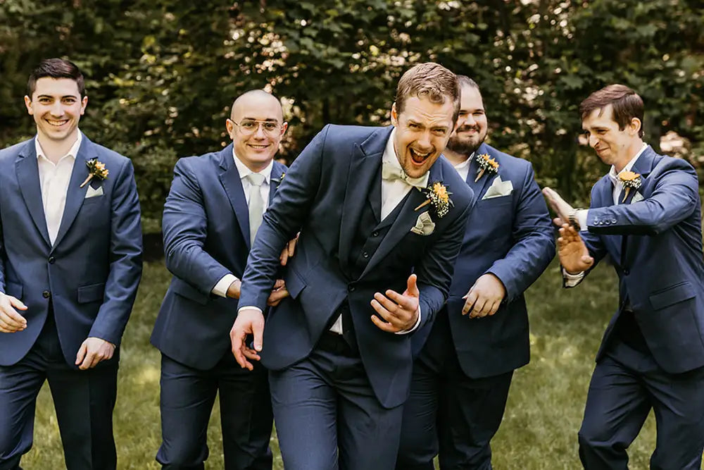 wedding party in navy blue suits