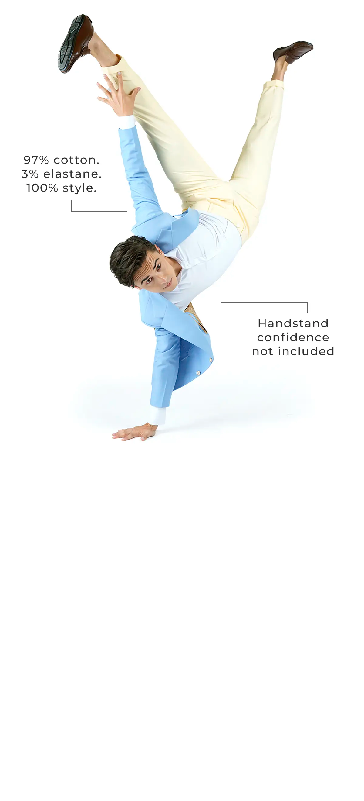 Person in light blue shirt and beige pants performing a handstand on a white background