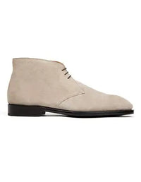 Beige suede ankle boot on a white background