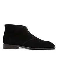 Black suede shoe on a white background