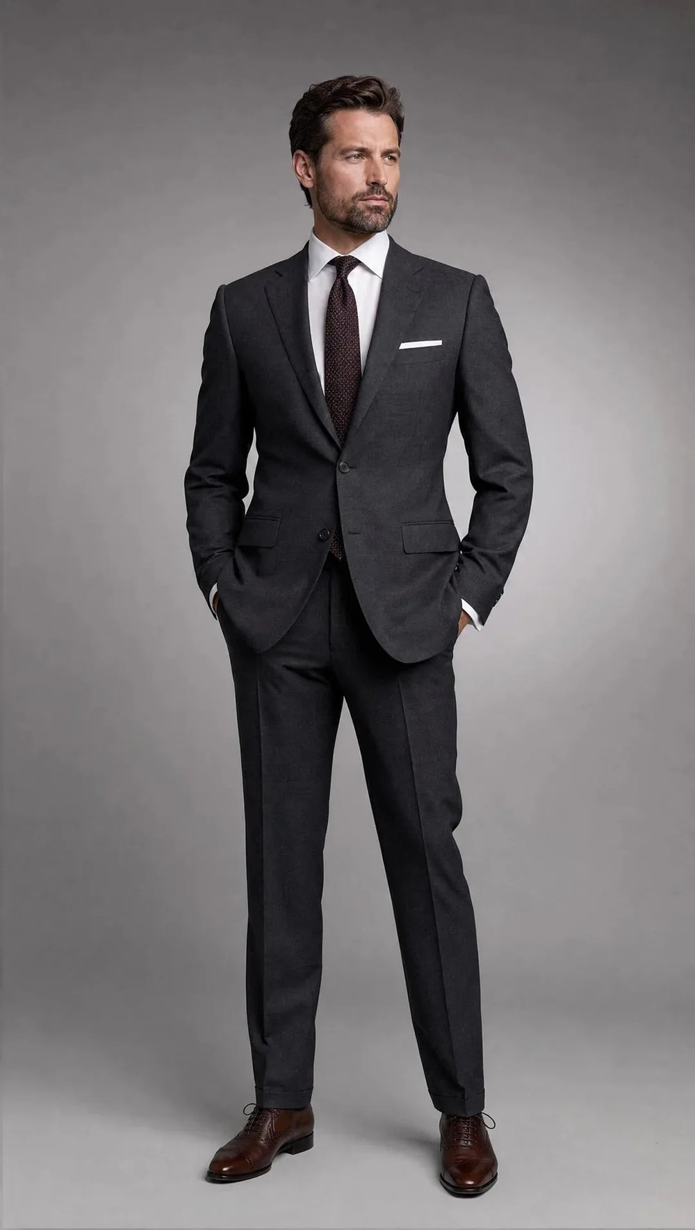 When alterations reach their limit, custom tailoring starts from your measurements — shoulders, chest, and waist are drafted to your body rather than adjusted after the fact