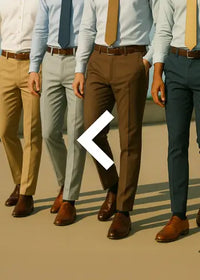 four men walking outside in semi formal pants