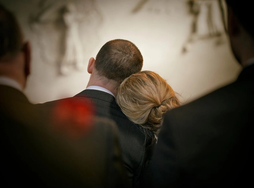 Christian & Catholic Funerals. Expect formal, dark attire. A black suit and tie are standard.