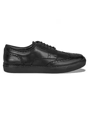 Black leather shoe on a white background