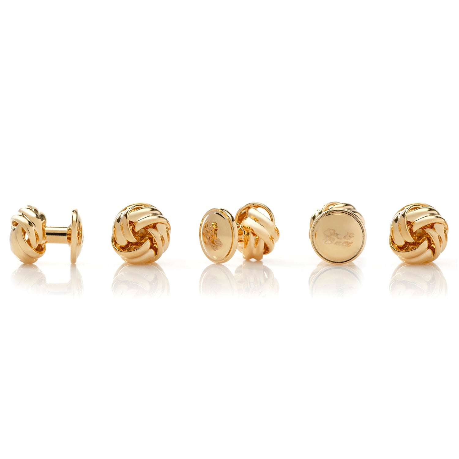 Gold Knot 5-Studs — on a shirt cuff247