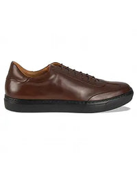 Brown leather shoe on a white background