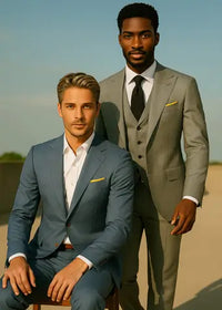 Two men in suits sitting outdoors with a clear sky.