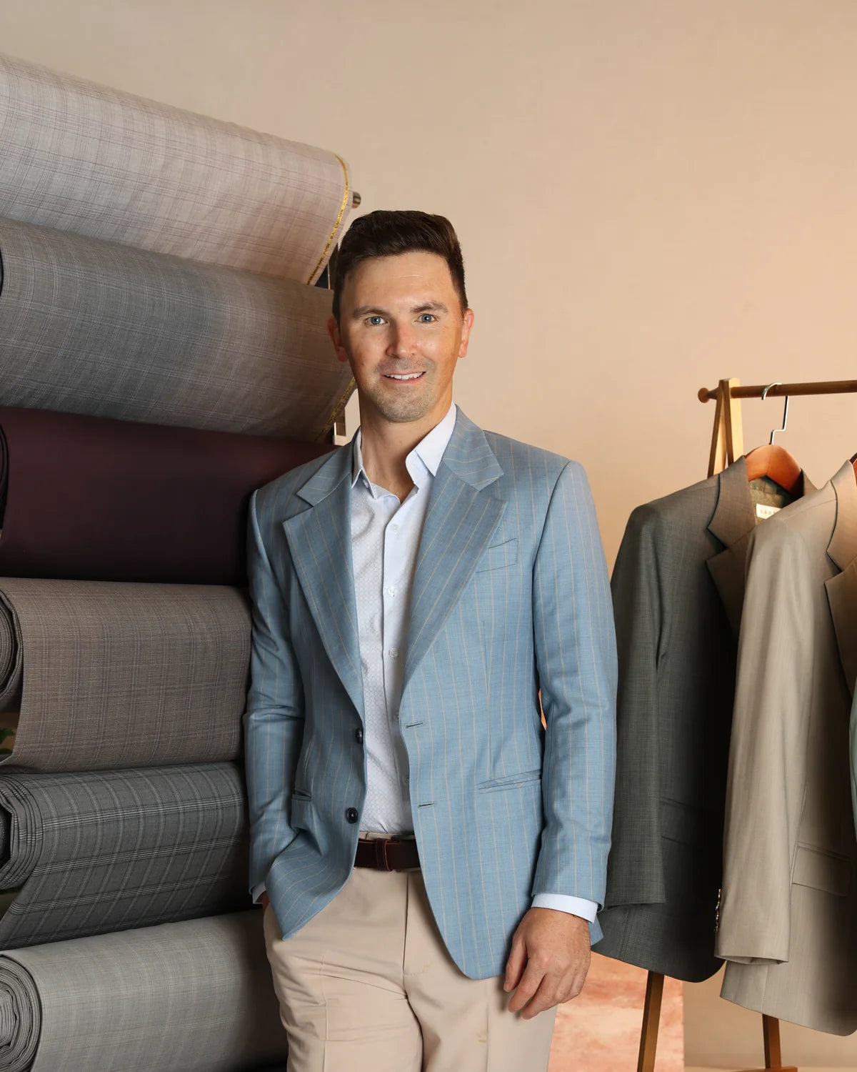 Andy Fine, founder of Sartoro, among the suiting fabrics