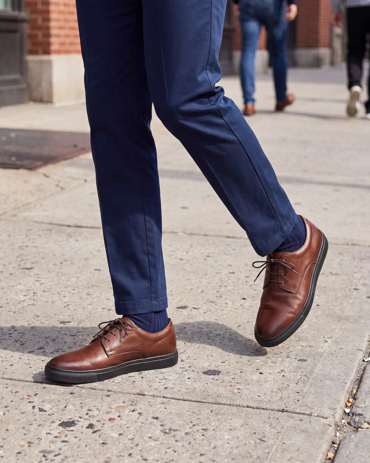 Lots of walking ahead? A derby on a rubber sole grips better than leather, and its laces hold your foot in place.