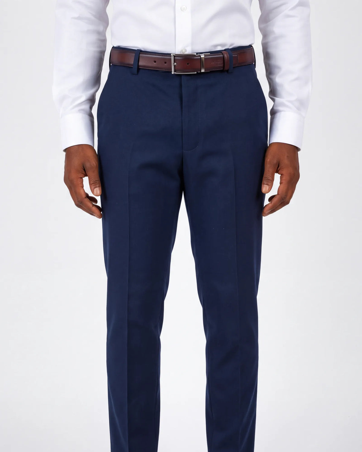 Match the belt to your shoes in color and finish. A smooth brown belt goes with smooth brown leather shoes.