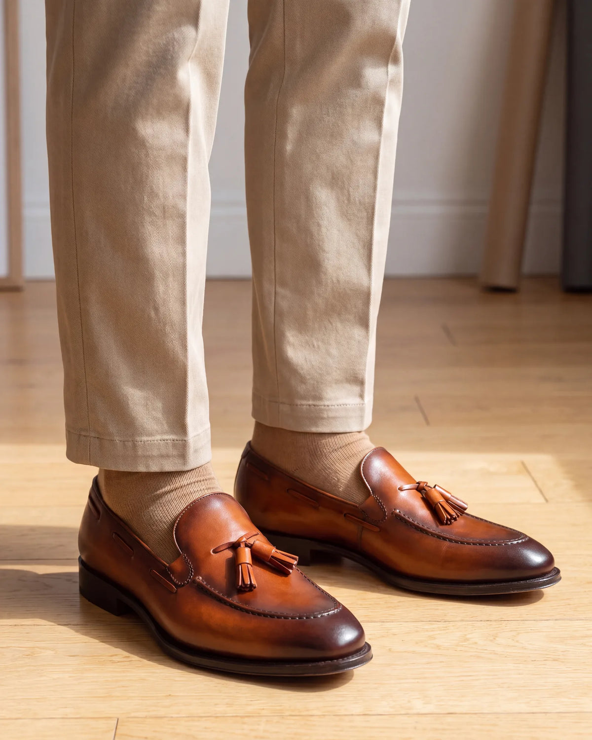In a creative or agency office, lighter browns are welcome, so tan loafers fit right in.