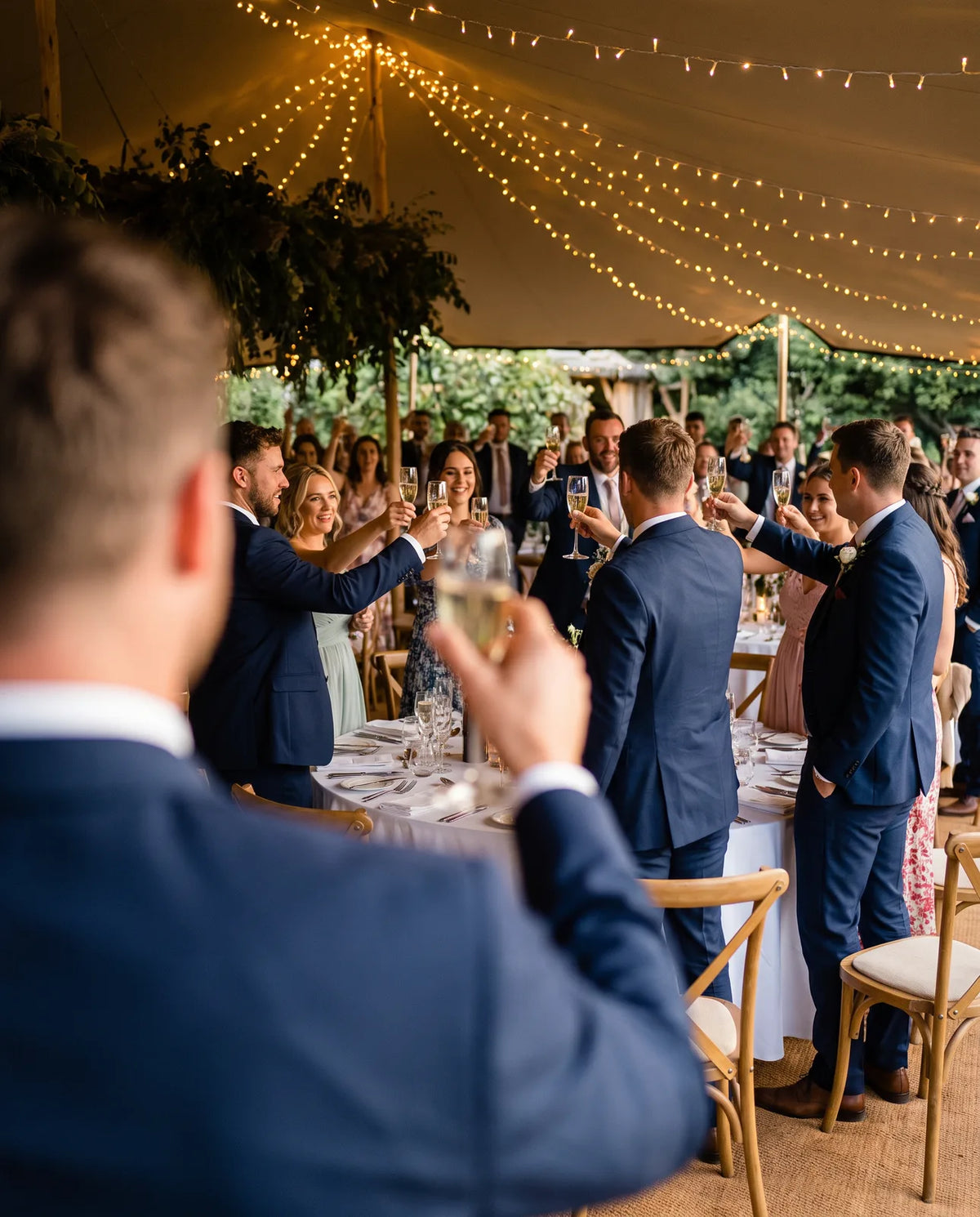 Close by asking everyone to stand, then name both people as you raise your glass.