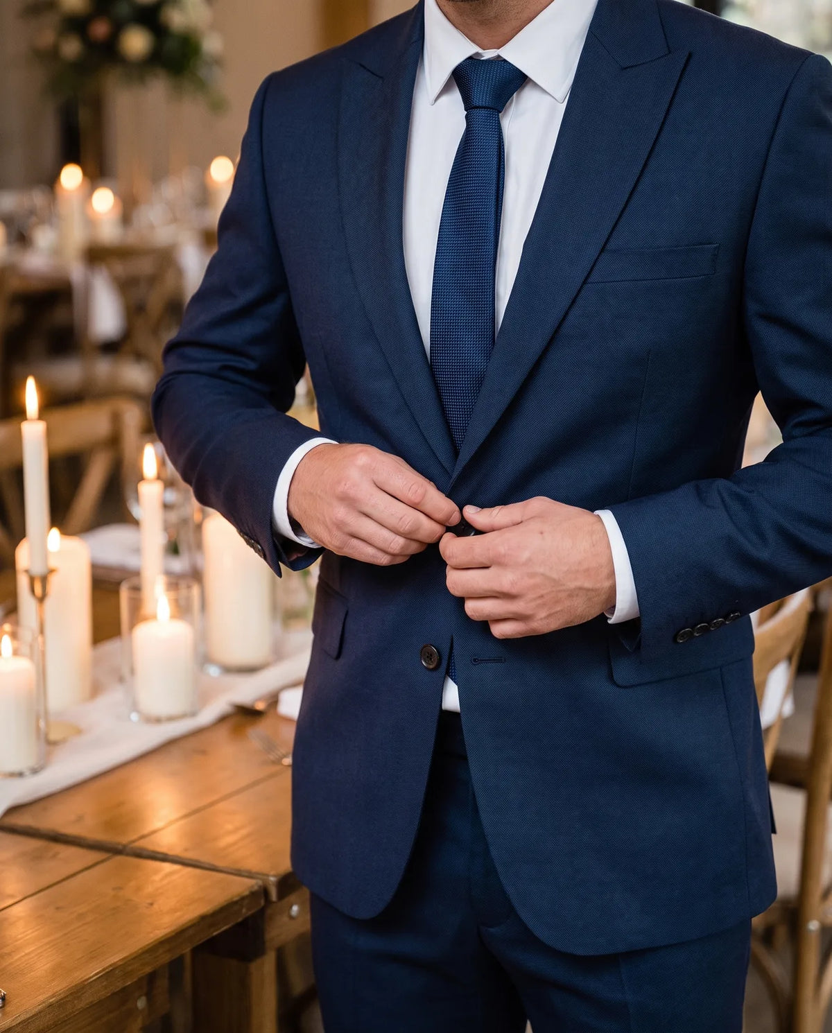 Do up the jacket before you speak. On two buttons, close the top one and leave the lower one undone.