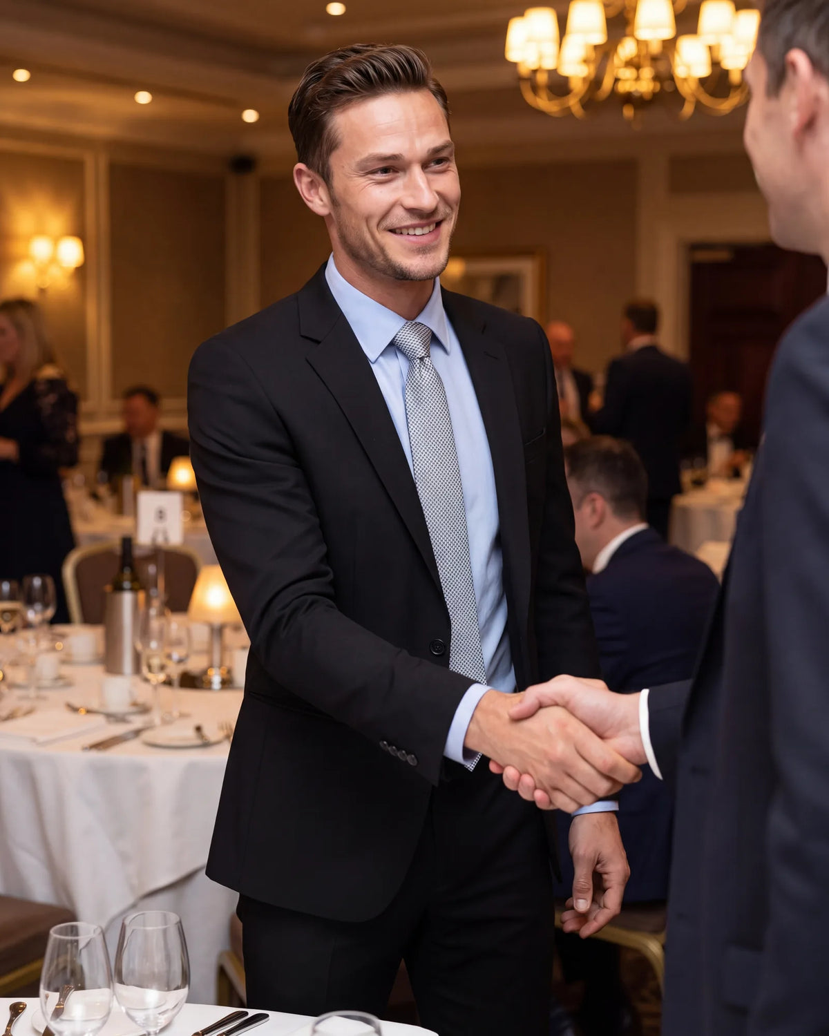 Dressing for an awards or client dinner? Light blue with silver is the least formal way to wear black.