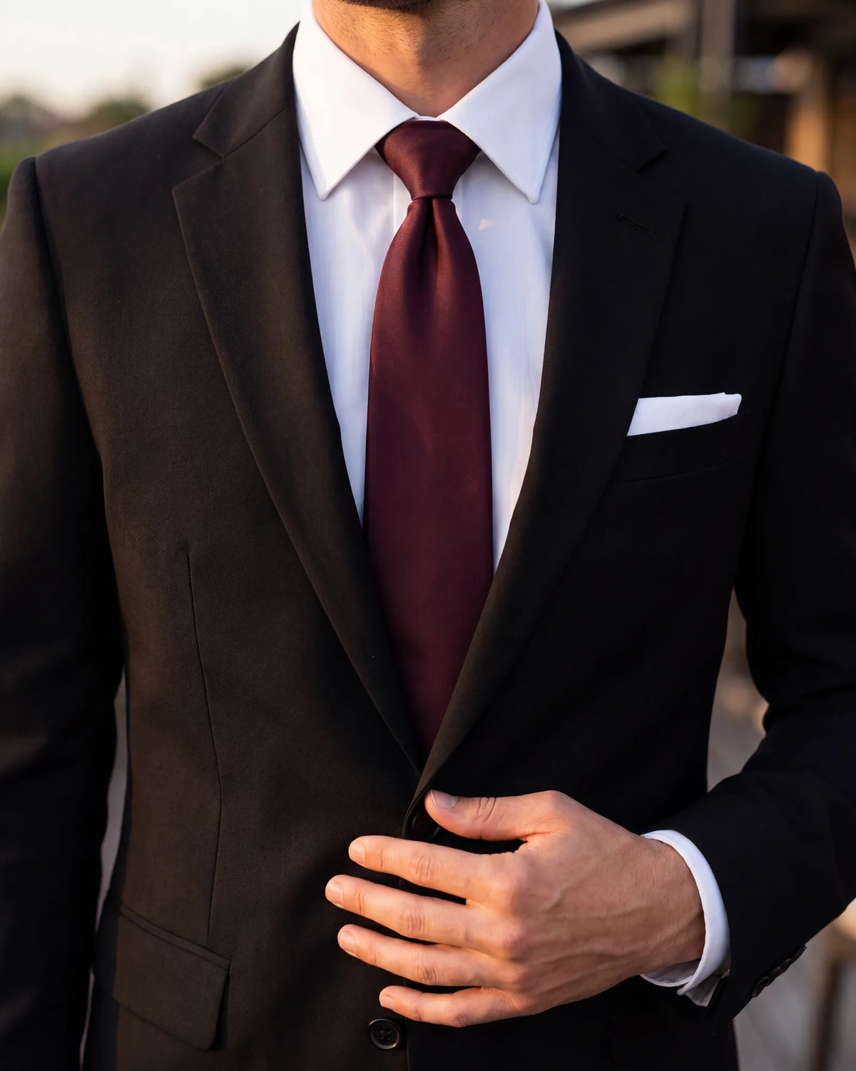 Want one color at an evening event? Choose burgundy, never bright red, and add a white square.