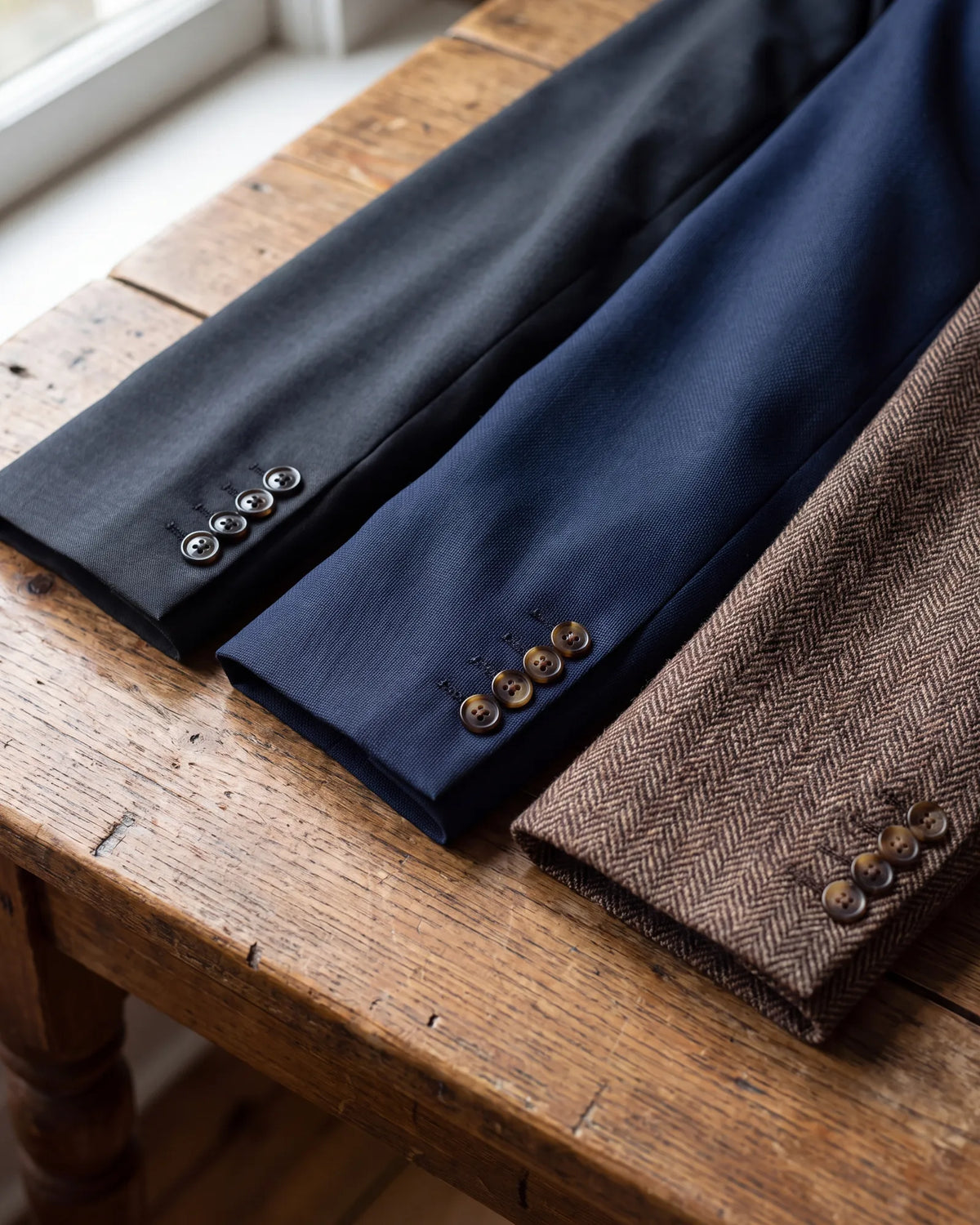 No trousers to compare? Let the cloth decide: smooth worsted points to a suit jacket, solid navy to a blazer, textured herringbone to a sport coat.