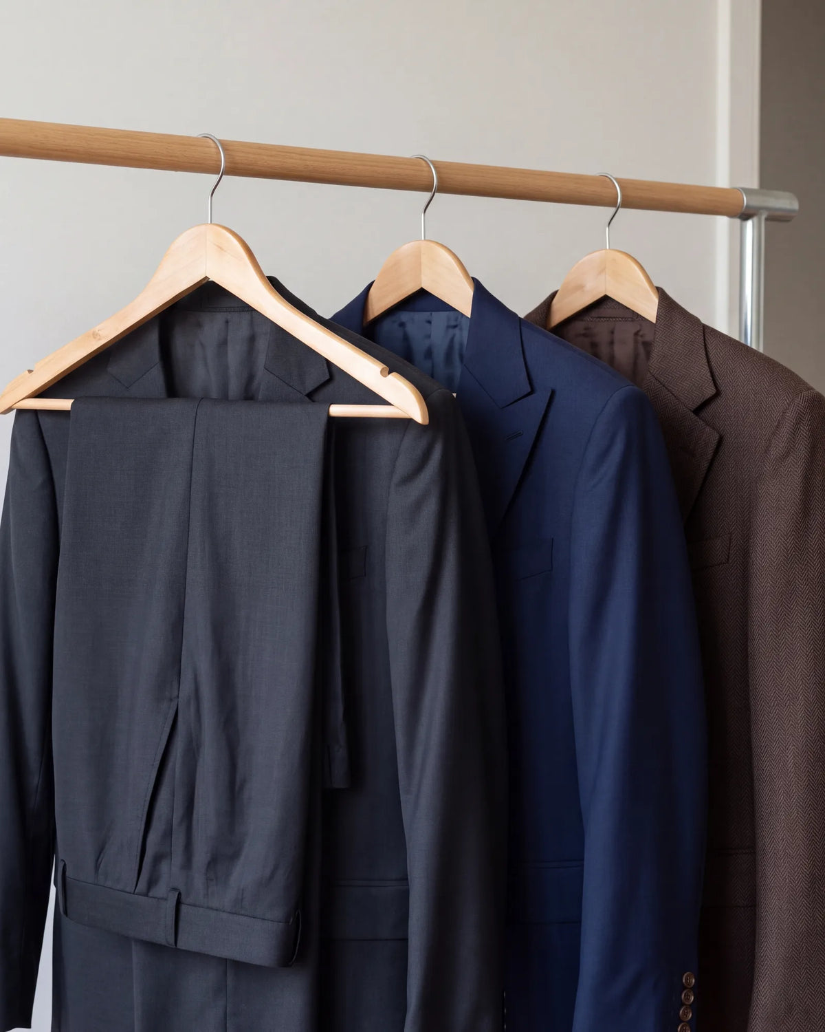 Start with the trousers. Only a suit jacket has a pair cut from the same cloth, while a blazer or sport coat is worn with something different.