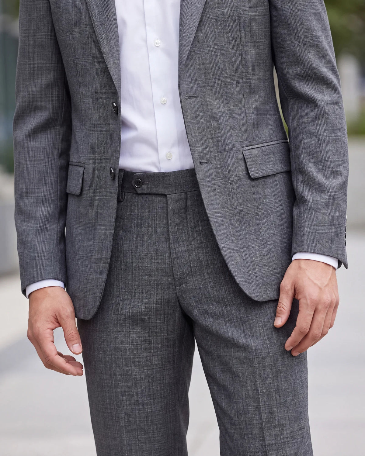 Is it a suit jacket? The check, the color and the texture should carry straight through to the trousers.