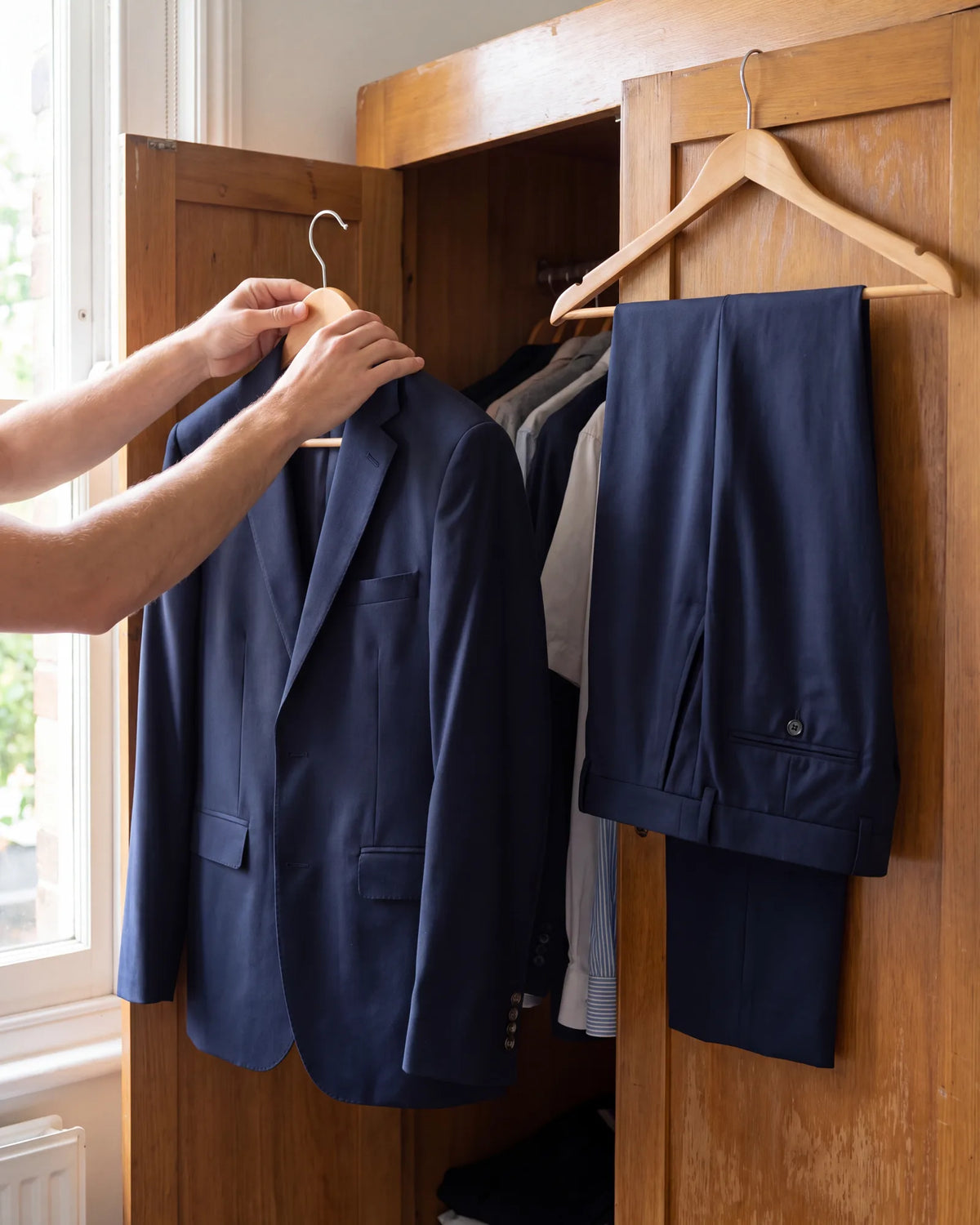 Not sure whether a navy jacket is a blazer? Look in the closet for trousers in the same cloth. If you find a pair, you have a suit jacket.