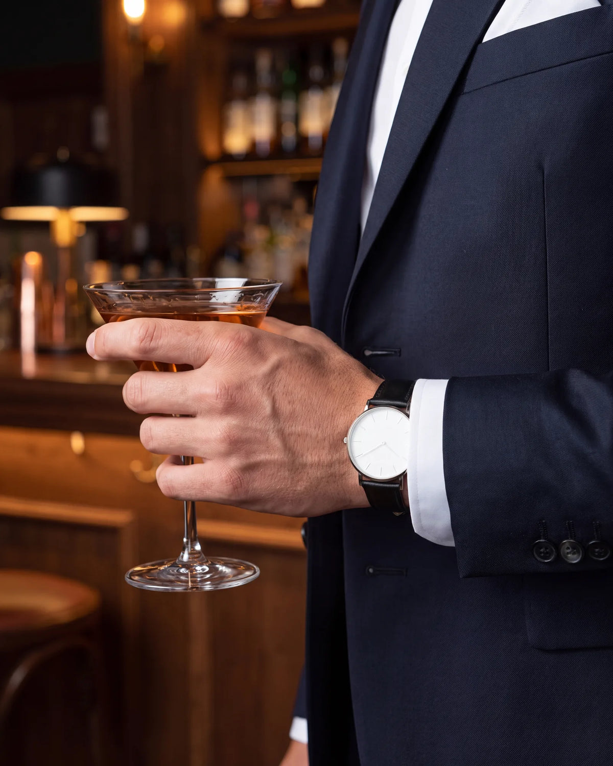 Check your wrist before you go. A dress watch on a leather strap suits every cocktail event, so leave the rubber sport strap at home.