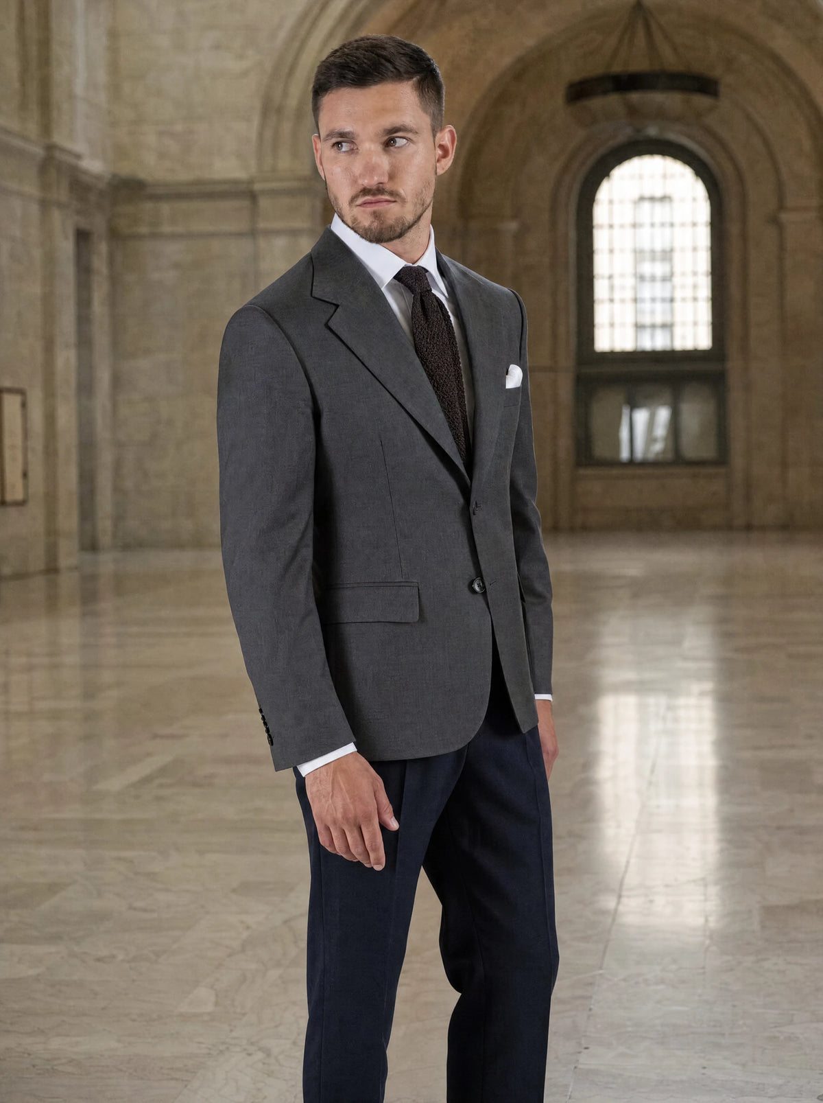 Ellis Charcoal Sharkskin Jacket worn by a model, railway station concourse746