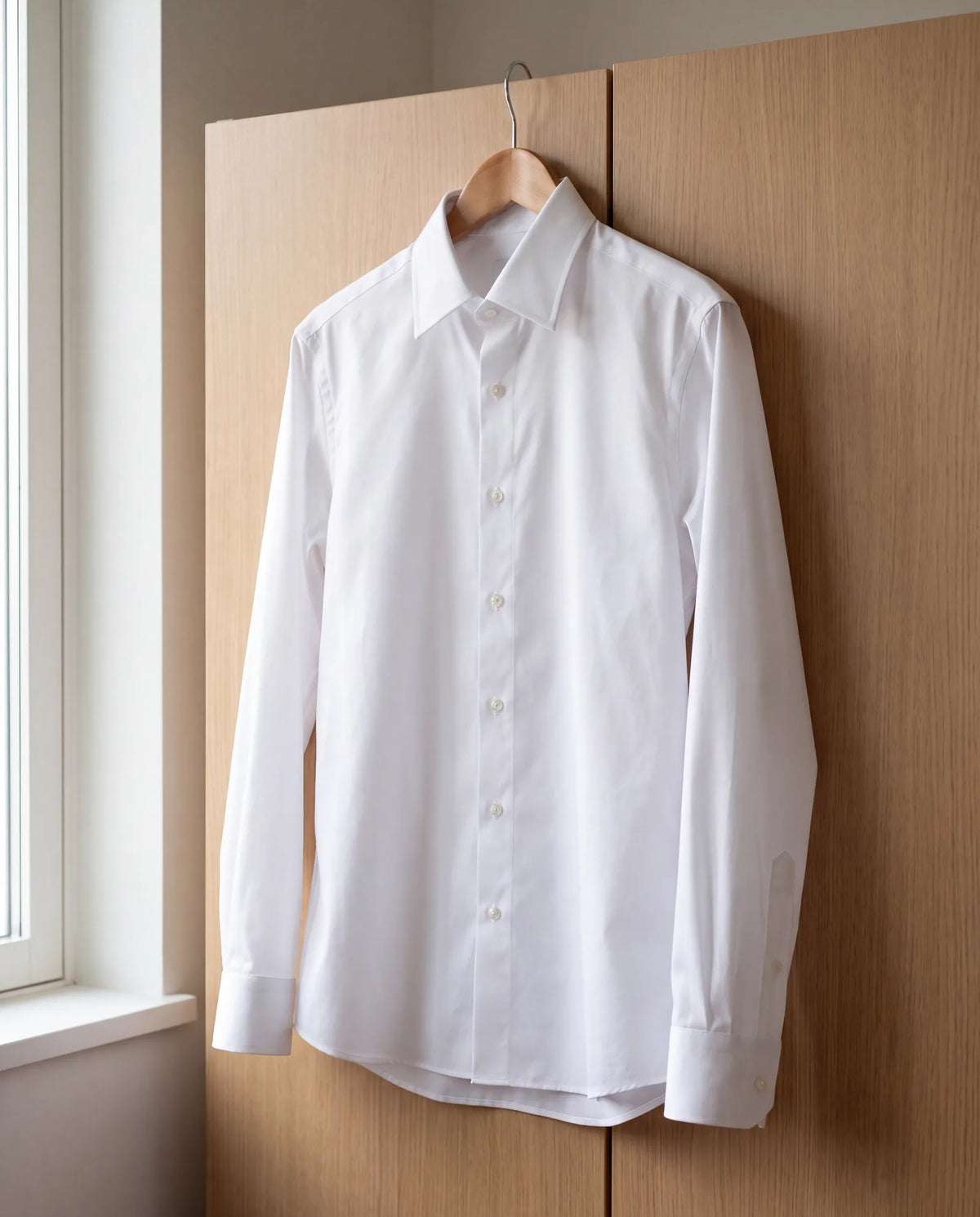 Anything wrinkled stands out at a funeral, so wear a white shirt that is freshly pressed.