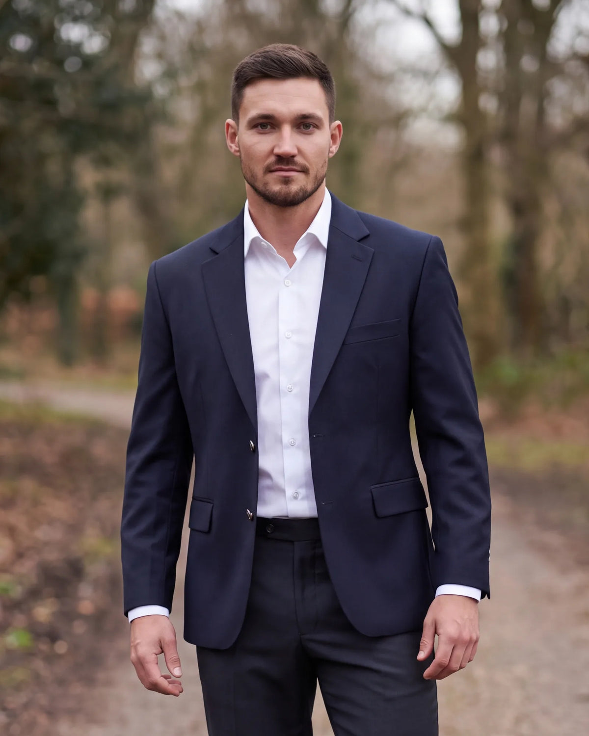 A less formal service allows a jacket and dark trousers without a tie, though a tie is still welcome.
