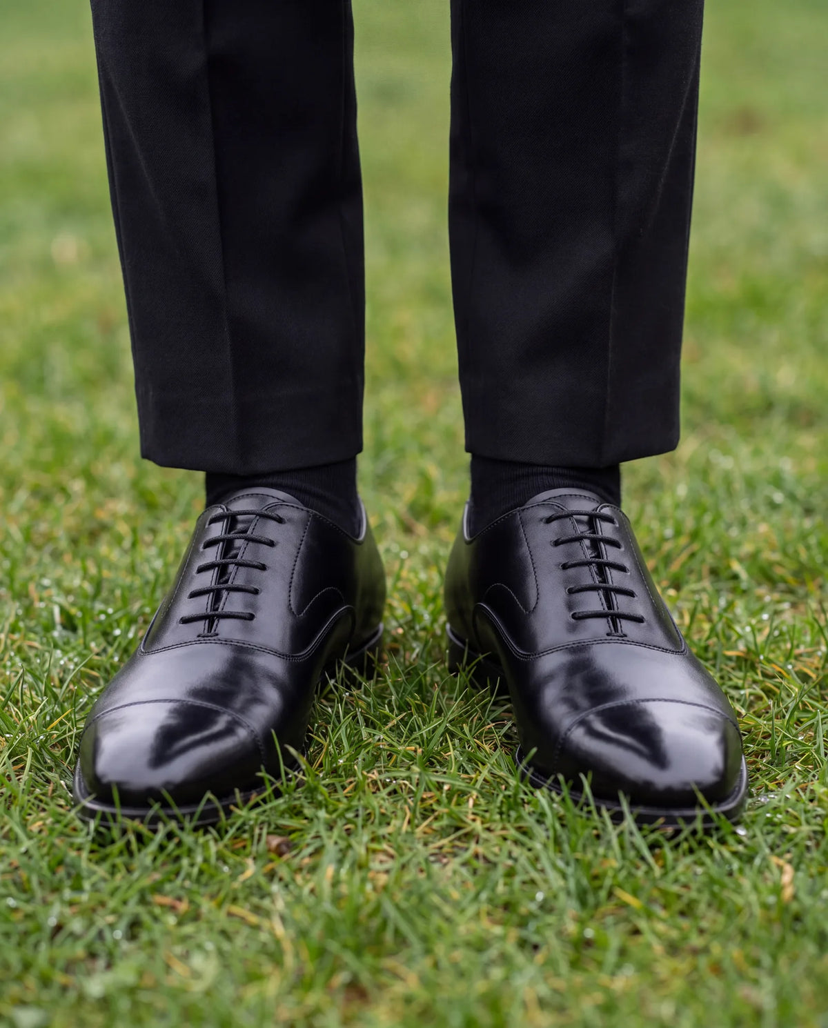 Pallbearers and close family need practical shoes for the graveside, such as black lace-ups with some grip.