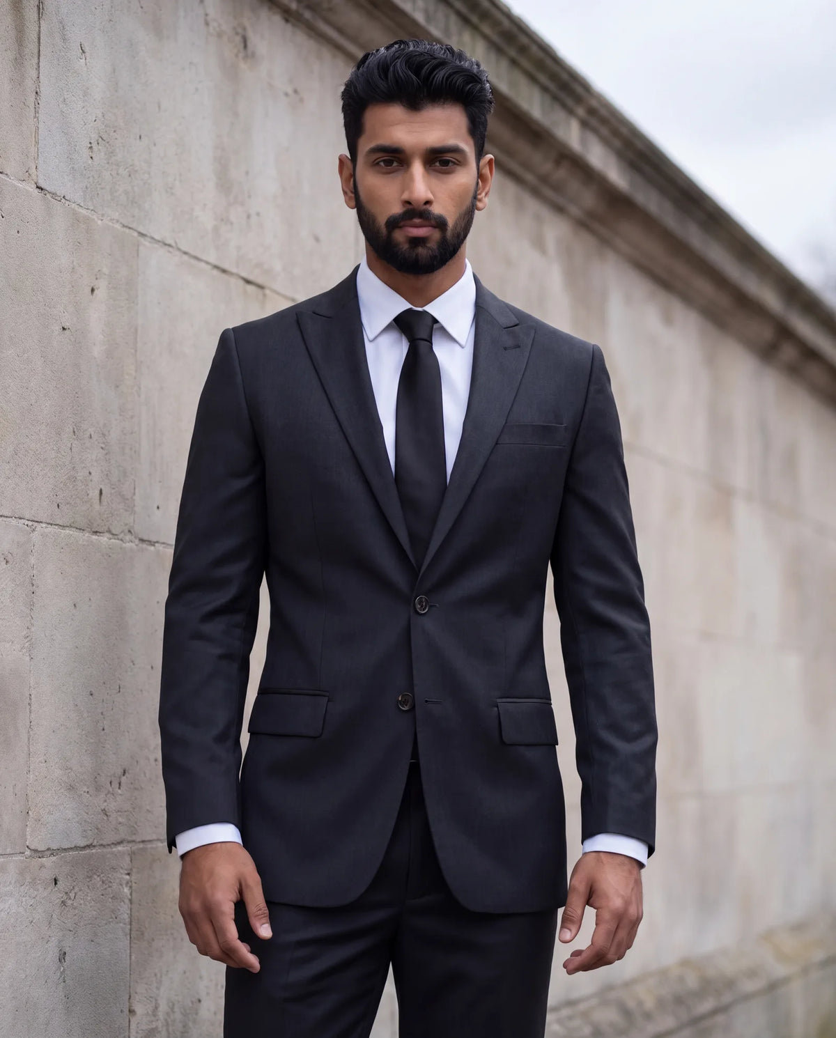 Customs vary by faith and family, so ask someone close to the family when you can. A Catholic service expects a conservative dark suit and tie.