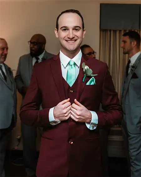 customer in burgundy suit