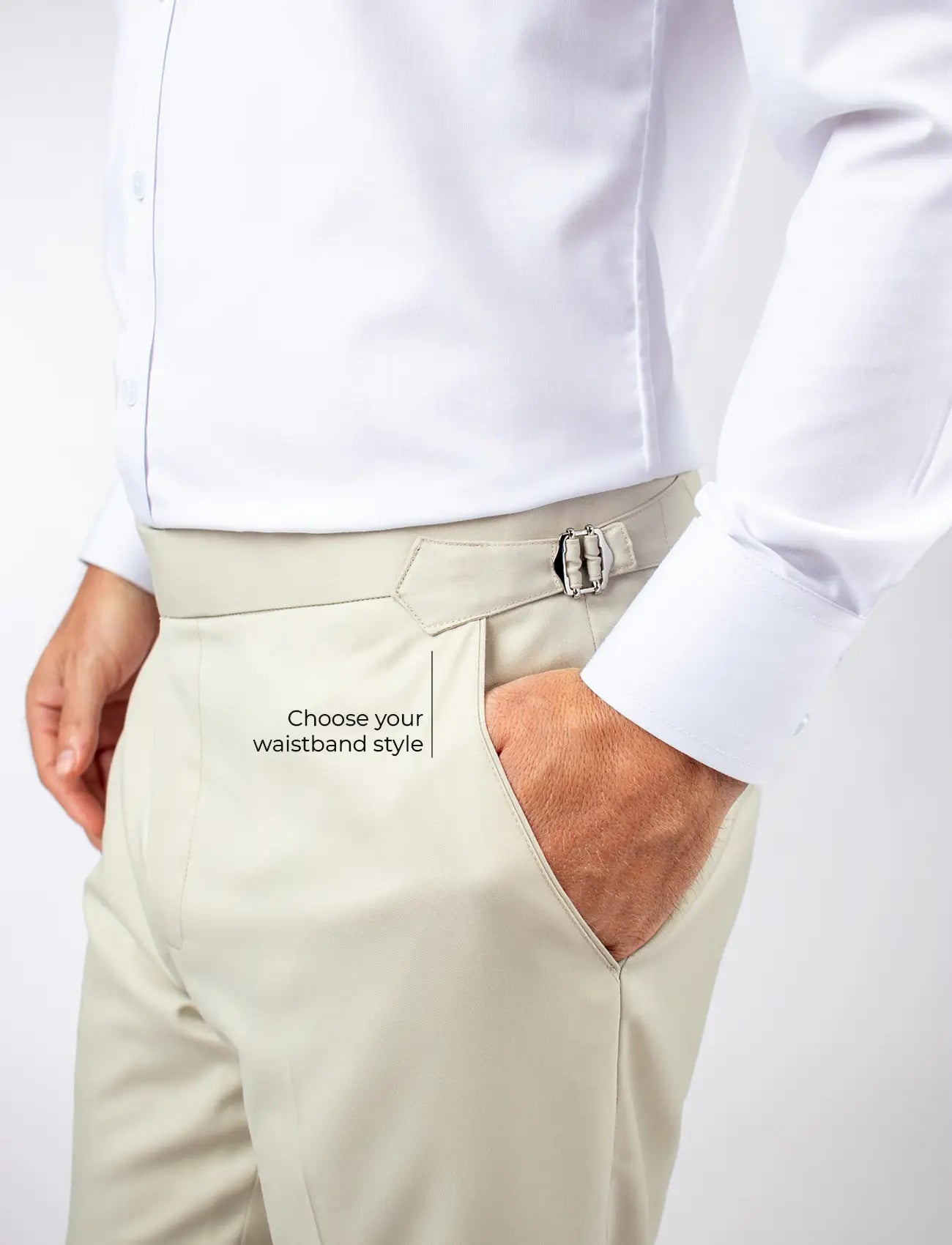 side adjusters on waistband of tan suit