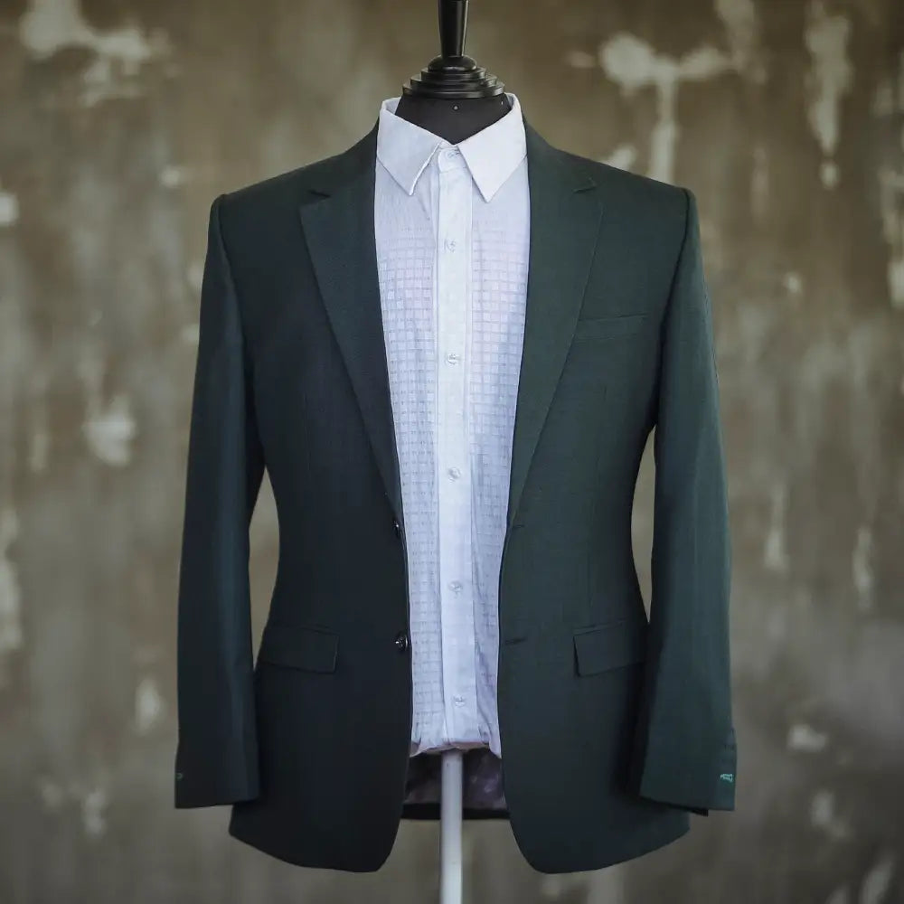 sartoro green suit on bust