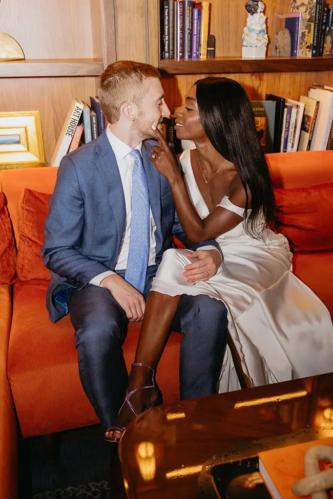 Customer in blue suit with bride