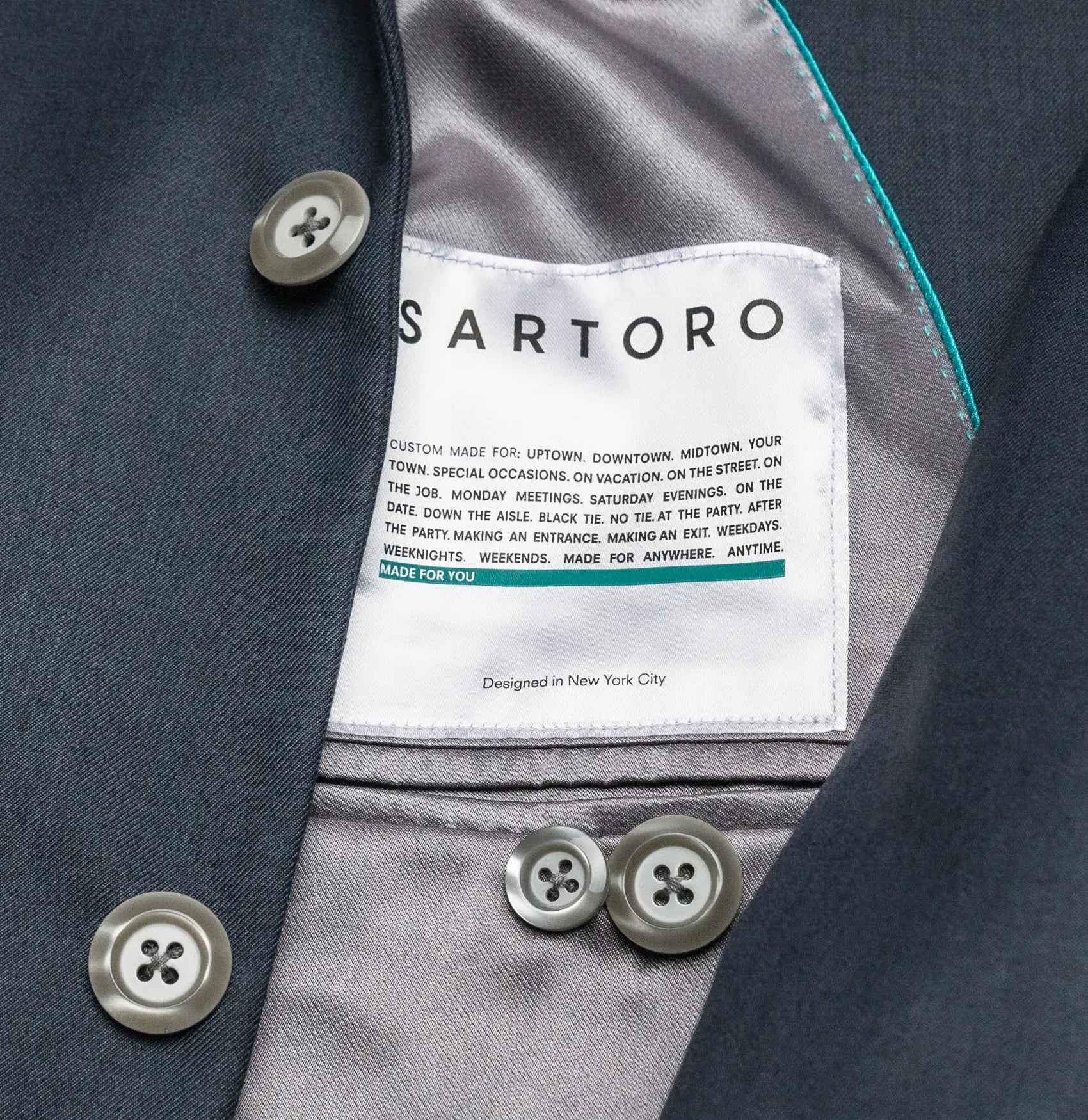 close up of sartoro suit patch inside jacket