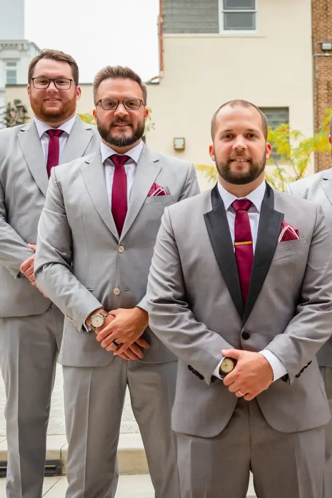 Wedding party in light grey suits