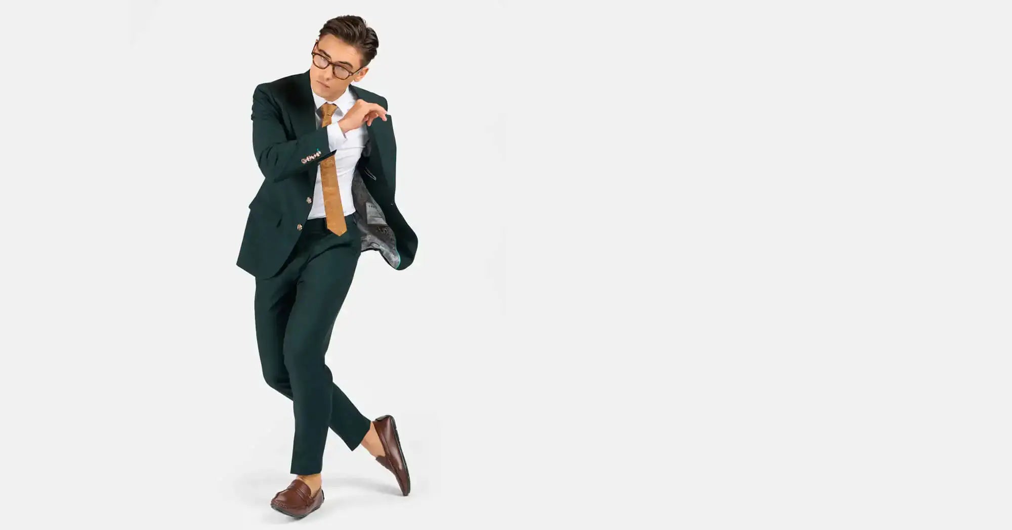 man dancing in green suit