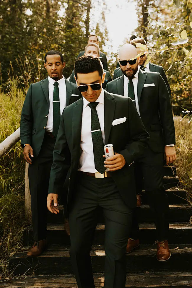 Wedding party in green suits