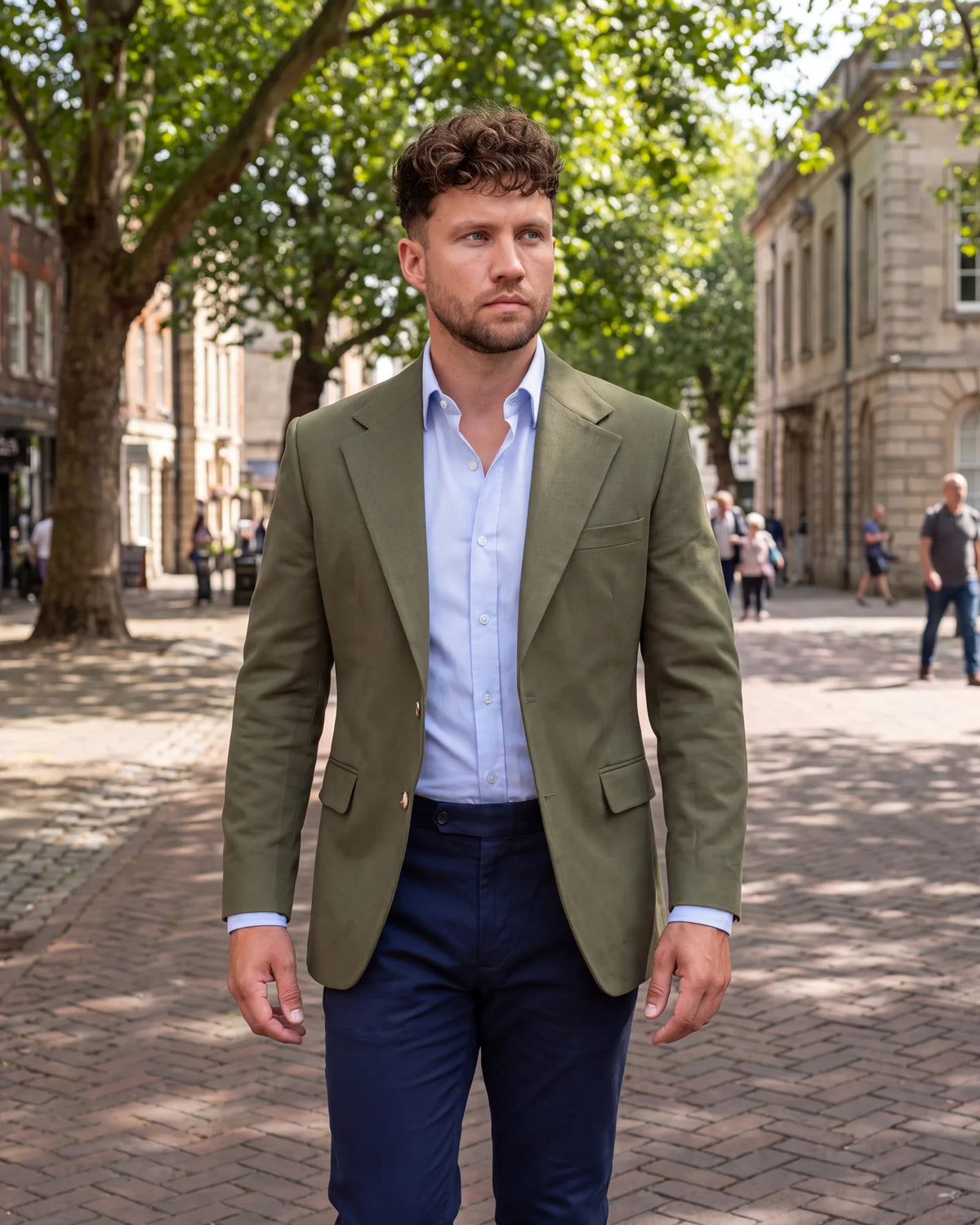 Wearing the jacket alone? Olive suits this well, because its earthy tone sits between formal and casual.