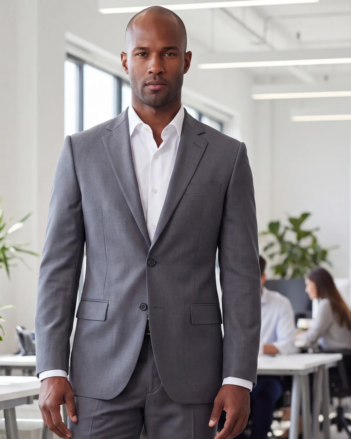 Heading to a tech or creative interview? Mid-gray works there, and an open collar is usually the right call.