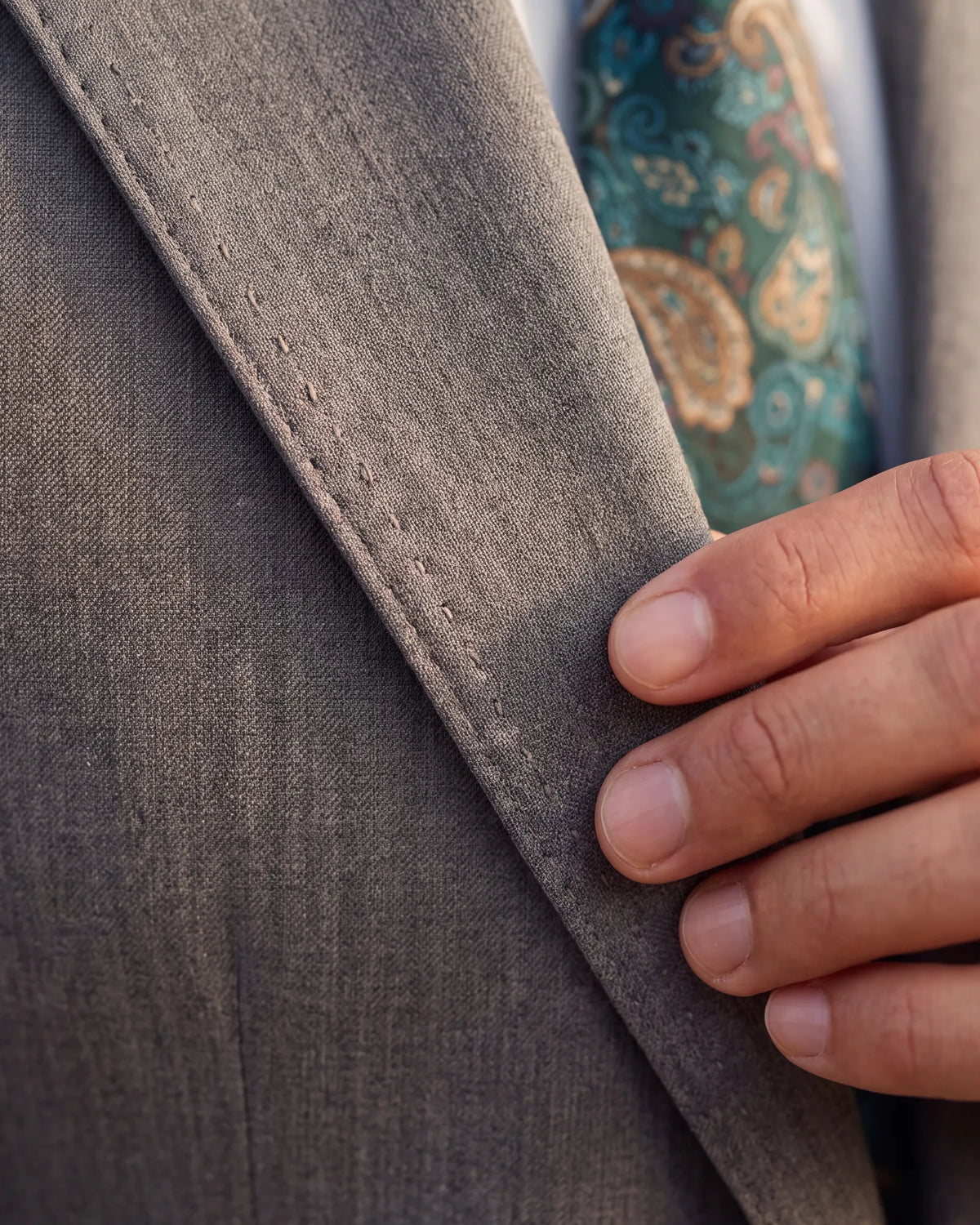 Do not take pick stitching along the lapel edge as proof of handwork. Machines sew it too.