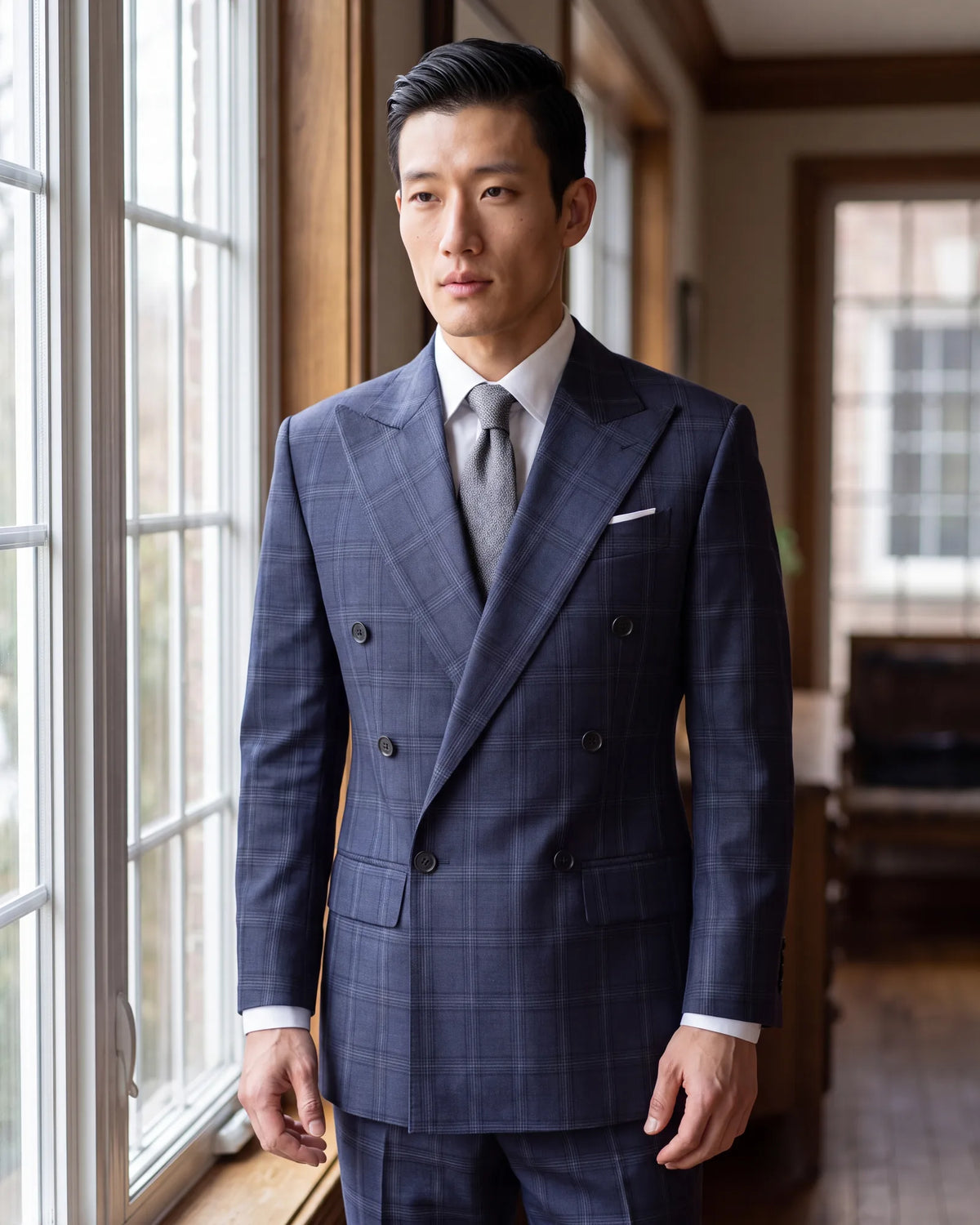 Ordering a double-breasted suit? Pick peak lapels, the standard choice for that cut.