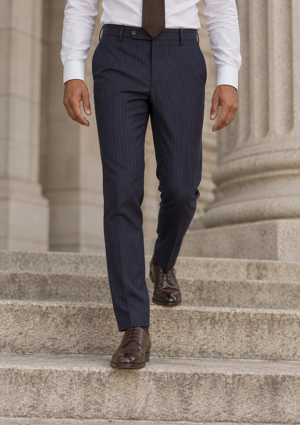 Midnight Blue Pinstripe Pants worn by a model, courthouse portico99