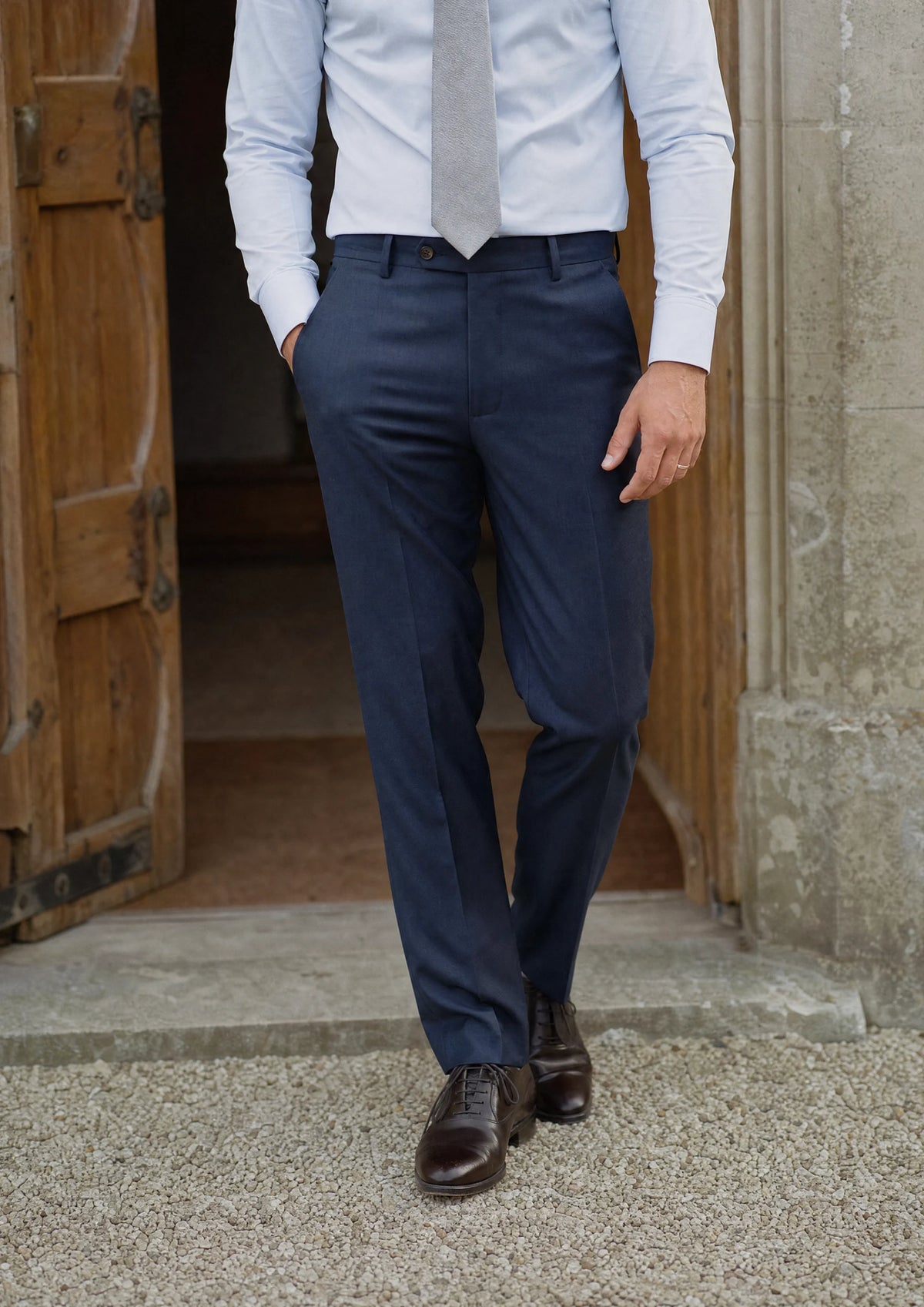 Navy Sharkskin Pants worn by a model, chapel doorway361