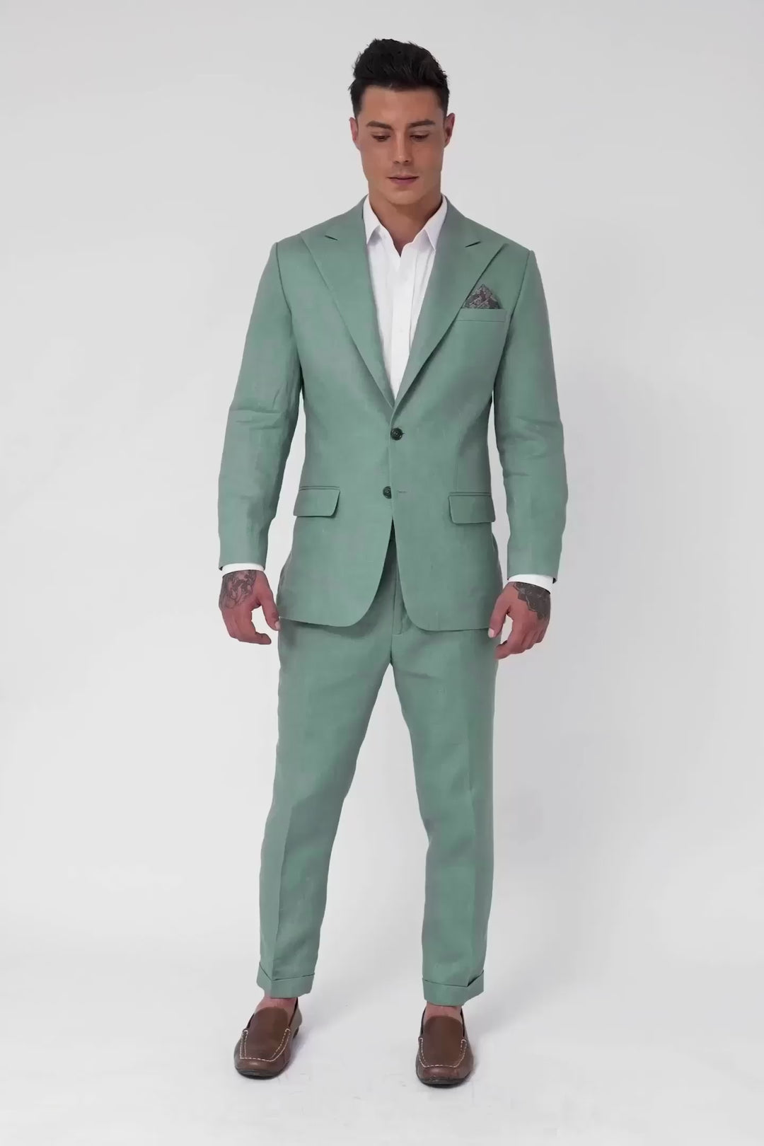 video of model wearing the Jade Green linen suit posing in different ways