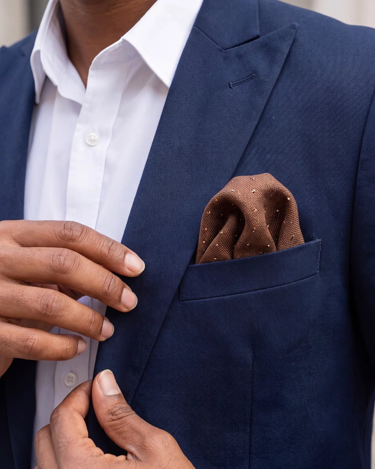 Keep a puff to about 1.5 inches above the pocket. Any higher and it starts to spill out and look untidy.