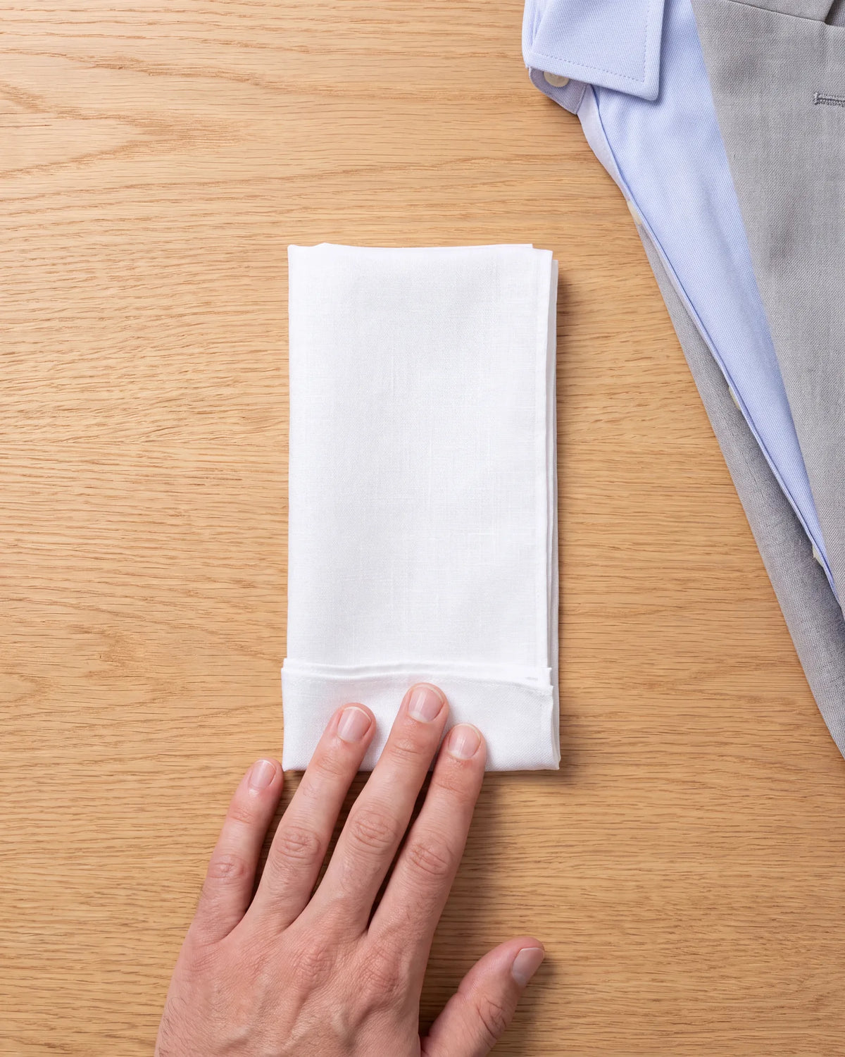 Size the square to your pocket. Keep turning the bottom up until it stands roughly 1/4 to 1/2 inch taller than the pocket is deep.