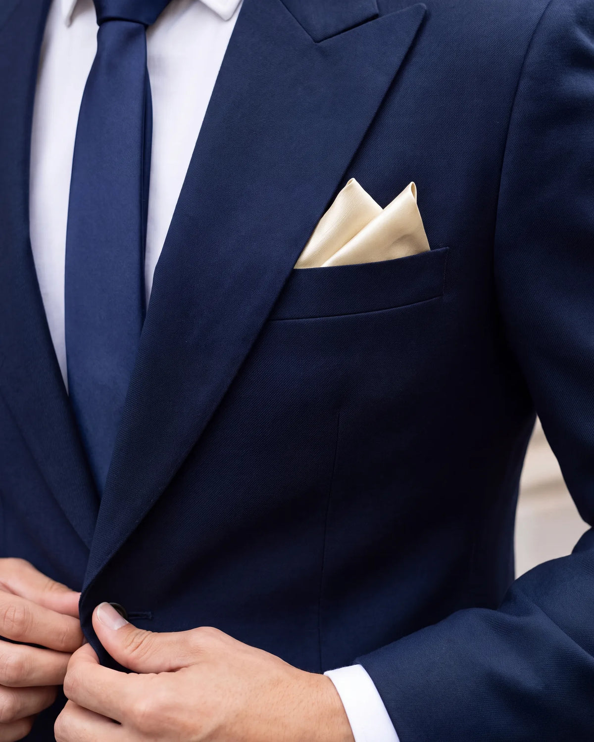 Wear the two-point to business and smart casual settings. It reads a little more relaxed than the one-point.