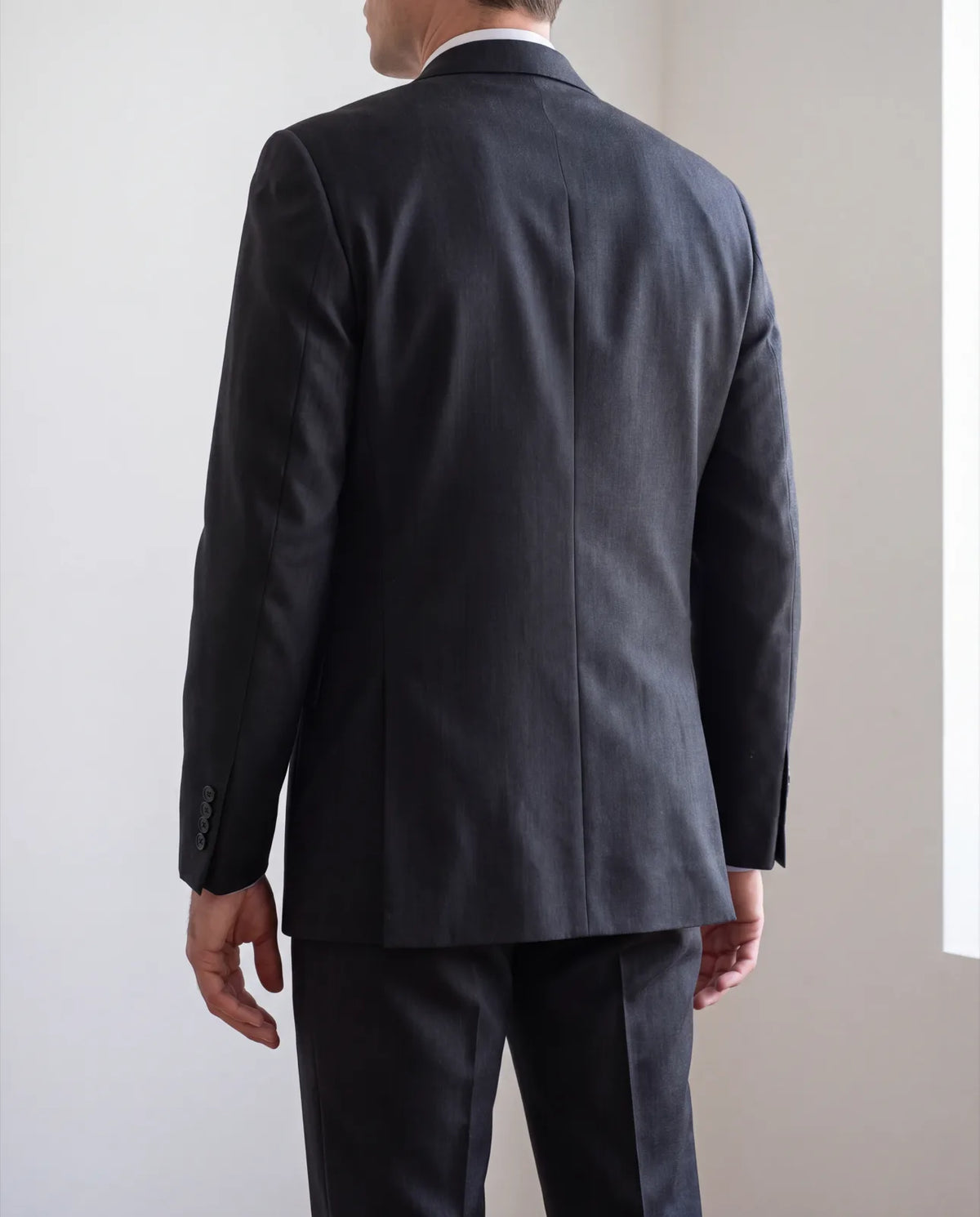 Check the back in a mirror. The hem should cover your seat, because jacket length is hard to change later.